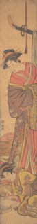 Young Woman Looking over Shoulder of Another who is Writing a Letter.