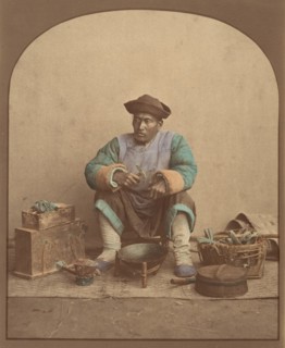 [Chinese Man Sitting with Tools], 1870s.