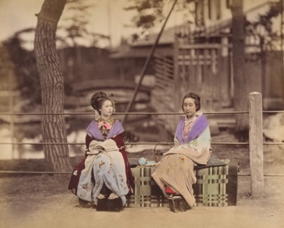 [Two Japanese Women Sitting on a Bench], 1870s.