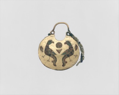 One of a Pair of Temple Pendants, with Confronted Birds (front) and Human Heads (back), Kievan Rus', 11th-12th century.