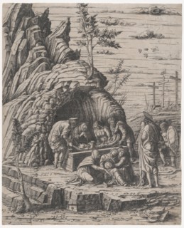 The Entombment of Christ who is being lowered by two men into a stone tomb before...