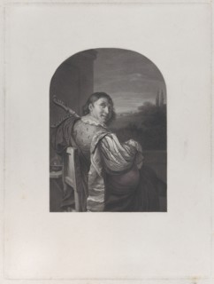 Man seated with a musical instrument