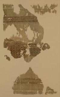 Portion of a Garment with Geometric Patterns