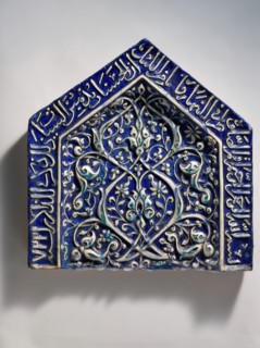 Tile from a Mihrab, Iran, dated A.H. 722/ A.D. 1322-23. Inscription a Qur'anic reference to the mihrab?s function, common during the Ilkhanid period in Iran.