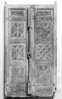 Pair of Carved Doors, Iran, dated A.H. [8]70/ A.D.1466. Teak doors with inscriptions in naskhi script with name of the patron, Davud ibn Ali Davud, and the artist, Ustad Muhammad,