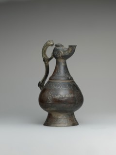 Ewer with Lamp-Shaped Spout, Iran, late 12th century. Arabic inscriptions of good wishes to the owner.