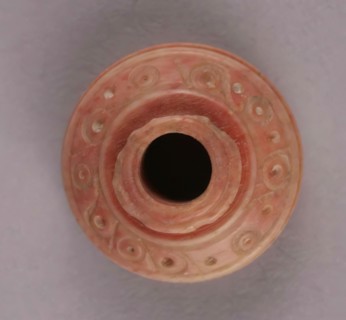 Spindle Whorl, Iran, 9th-10th century.  Excavated at Nishapur, providing evidence the city possessed a thriving textile industry.