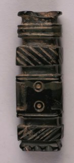 Fragment, Iran, 9th-10th century. Dot-in-circle motif presumed to be of magical significance.