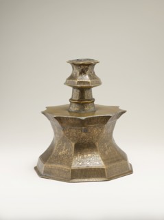 Candlestick with Figural Imagery, Iran or Iraq, first half 14th century. Nine-sided candlestick with depictions of courtly pastimes