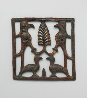 Appliqué Plaque with a Tree and Four Birds, Iran or Iraq, 12th century.