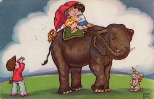 Children riding on an elephant, 1932.
