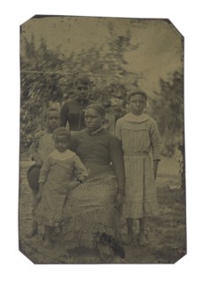 Tintype of a woman and four children, 1870s. Creator: Unknown.
