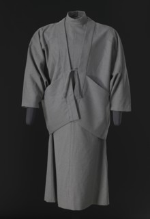 Grey pinstriped dress and jacket designed by Arthur McGee, mid 20th-late 20th century. Creator: Arthur McGee.