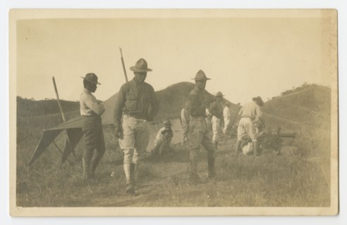 Photographic postcard of Charles Wilbur Rogan with his unit in the Philippines, 1910-1919. Creator: Unknown.
