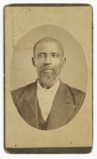 Photograph of a man with a beard wearing a dark colored suit and vest, late 19th cent - early 20th c Creator: Unknown.