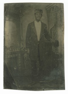 Tintype portrait of a man wearing a fur hat, late 19th century. Creator: Unknown.