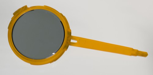 Bakelite hand mirror from dresser set owned by Lena Horne, mid 20th Century. Creator: Agalin.