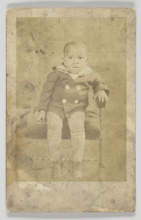 Photographic postcard of an unidentified young boy, 1926-1940s. Creator: Unknown.