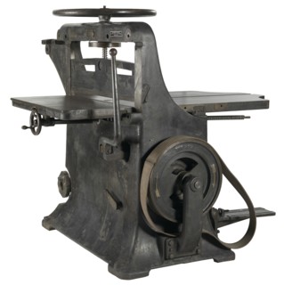 Paper cutter from The Baltimore Afro American Newspaper, 1900-1920. Creator: Chandler & Price.