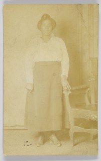 Photographic postcard of a woman, 1918-1930. Creator: Unknown.