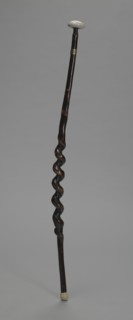 Carved wooden cane owned by Carl Brashear, after 1966. Creator: Unknown.
