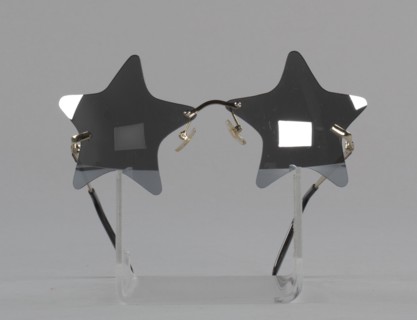 Bootsy Collins style star-shaped mirrored lens sunglasses, 1993-2013. Creator: elope, inc..