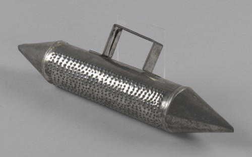 Costume oil can prop güira for Tin Man in The Wiz on Broadway, 1975. Creator: Fred Nihda.