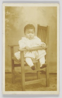 Photographic postcard of unidentified child, 1917-1930. Creator: Unknown.