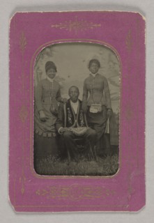 Tintype photograph of a man identified as James Turner, with two women, ca. 1873. Creator: H.G. Pearce.
