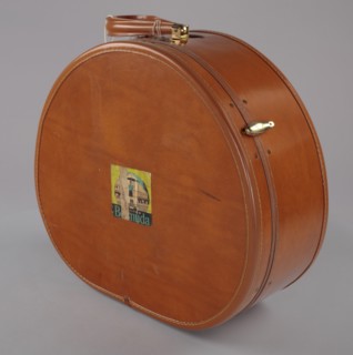 Samsonite hat box suitcase from Mae's Millinery Shop, 1941-1994. Creator: Samsonite.