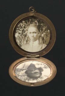 Locket with photographs of Harriette and Harry T. Moore, early to mid 20th century. Creator: Unknown.