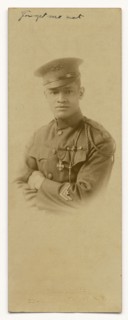 Photograph of Cpl. Lawrence McVey in uniform wearing the Croix de Guerre medal, ca. 1920. Creator: Alva Studio.