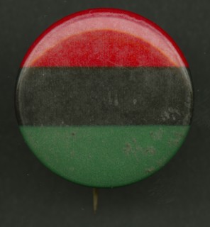 Pinback button of the Pan-African flag, after 1955. Creator: AFL-CIO.