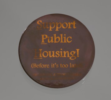 Pinback button promoting public housing in New York City, late 20th century. Creator: Unknown.