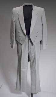 Grey tail coat worn by Cab Calloway, 1976-1995. Creator: After Six.