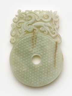 Disk (bi) with knobs, feline and dragon, Eastern Han dynasty, 100-220. Creator: Unknown.
