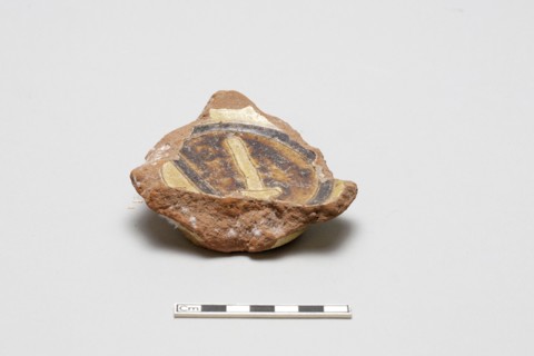sherd, red body, white slip, yellow glaze with brown stain, Mamluk period, 1250-1516. Creator: Unknown.