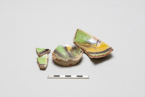 sherd, red body, white slip, yellow, green, black glaze, Mamluk period, 1250-1516. Creator: Unknown.