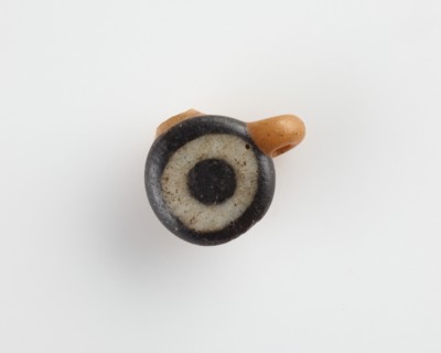 Eye-bead, with an eyelet and also a lateral bore, New Kingdom, 1550-1307 BCE. Creator: Unknown.