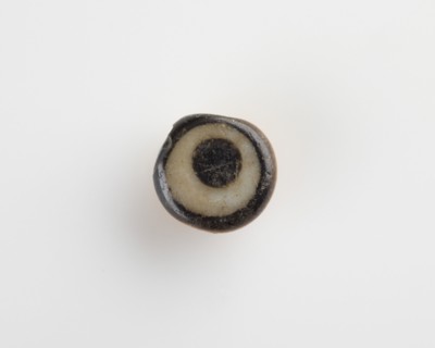 Eye-bead, with an eyelet and also a lateral bore, New Kingdom, 1550-1307 BCE. Creator: Unknown.