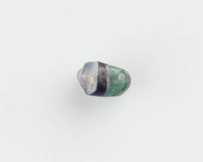 Bead, fragmentary; Translucent green and purple, New Kingdom, 1550-1196 BCE. Creator: Unknown.