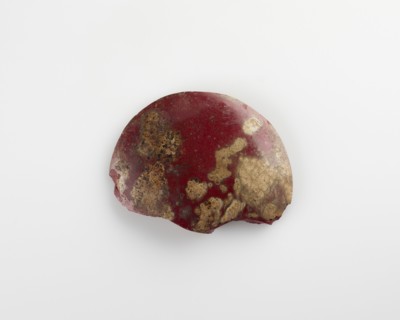 Fragment of a disk inlay; plano-convex, Ptolemaic Dynasty or Roman Period, 305 BCE-14 CE. Creator: Unknown.