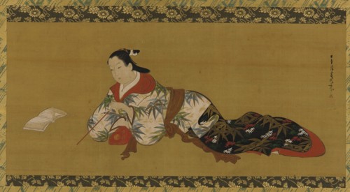 Yujo reclining and reading a musical score, Edo period, 1615-1868. Creator: Unknown.