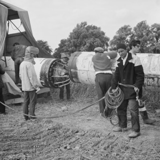 A team of men working on the lining up operation of the Fens gas pipeline, Norfolk, 24/07/1967. Creator: John Laing plc.