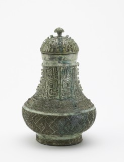 Lidded ritual wine container (hu) with masks and dragons, Late Shang dynasty, c13th century BCE. Creator: Unknown.