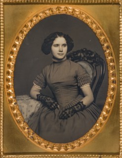 Untitled [portrait of a young woman in lace gloves], 1839/60.  Creator: Unknown.