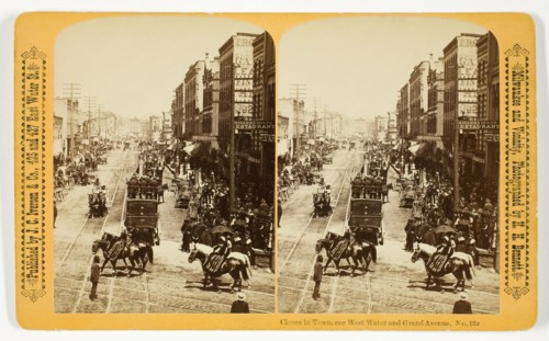Circus in Town, cor West Water and Grand Avenue, 1880/89. Creator: Henry Hamilton Bennett.