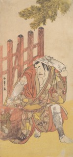 The Fourth Matsumoto Koshiro as an Outlaw Looking at a Wooden Ninsogaki, ca. 1779-83. Creator: Shunsho.