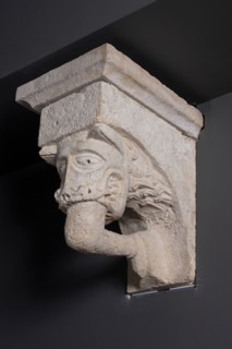 Corbel with Animal Mask with Teeth Fastened on Human Leg from the Monastery Church of... Creator: Unknown.