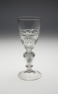 Wineglass Containing Two Uncirculated Charles II Silver Coins Dated 1670 and 1671, , c. 1690-1710. Creator: Unknown.